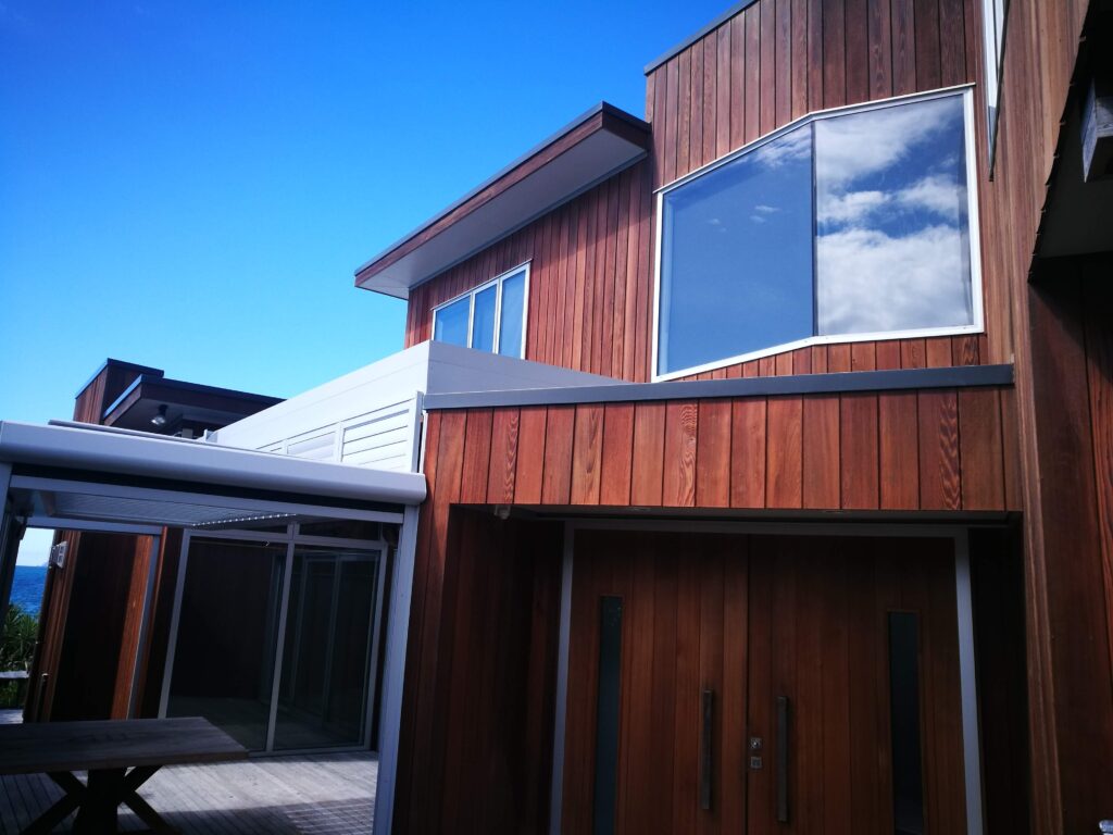 Whangapoua house with Dryden's wood oil with Elm tint